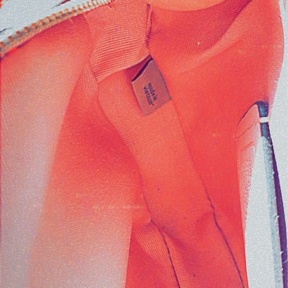 I am selling my coach bag. It is pink and red. Its a great Valentine’s Day gift. - Picture 3 of 4